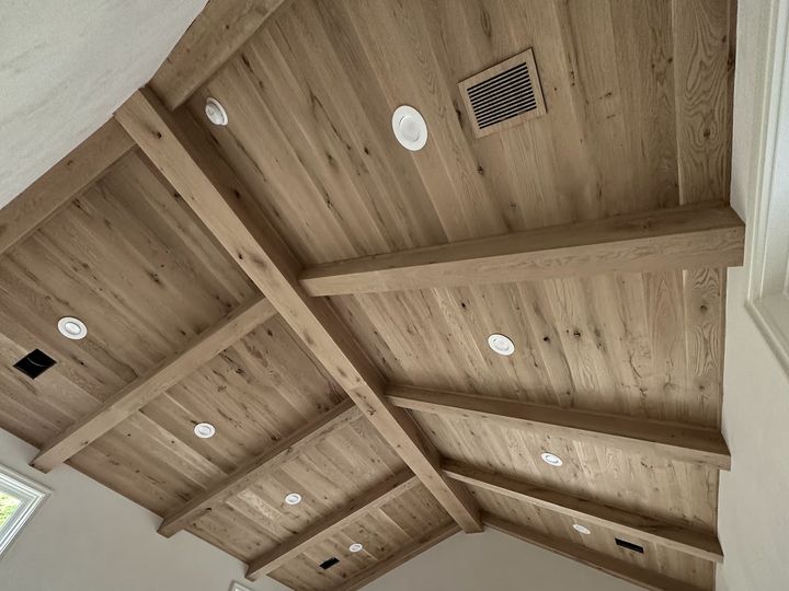 Vaulted oak plank ceiling with box beams, by SV Construction