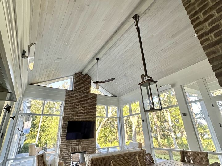 Vaulted plank ceiling over a screened porch, by SV Construction