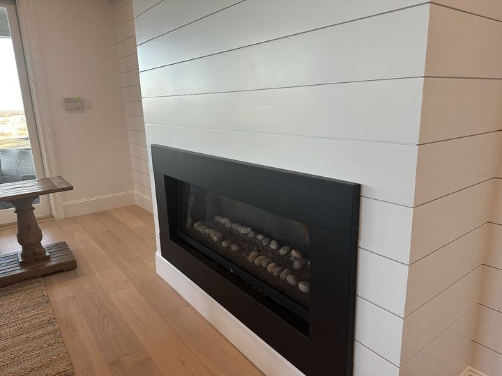 Shiplap fireplace surround detail, by SV Construction