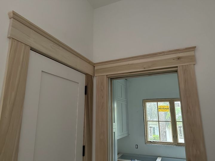 Door casings with crown headers, by SV Construction